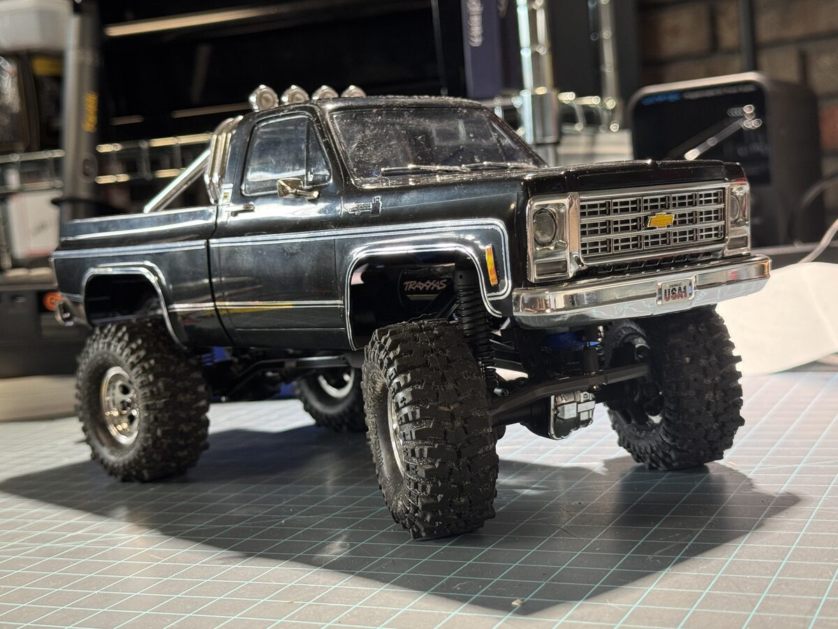 TRX4m K10 High Trail, front three-quarter view showing chrome bumpers and light bar