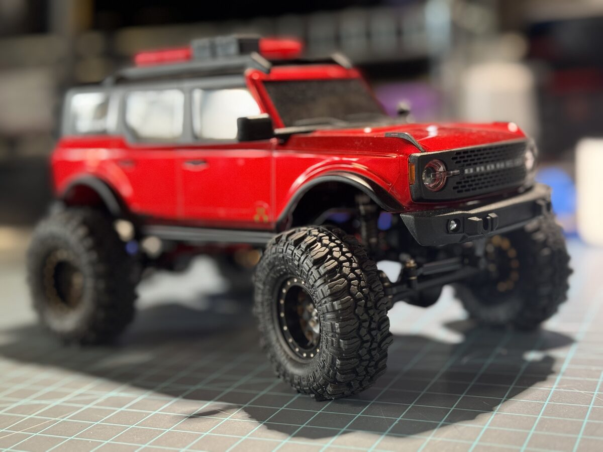 Red SCX24 Bronco, front three-quarter view