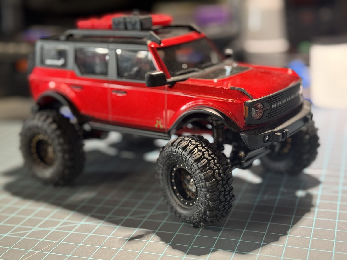 Red SCX24 Bronco, rear three-quarter view